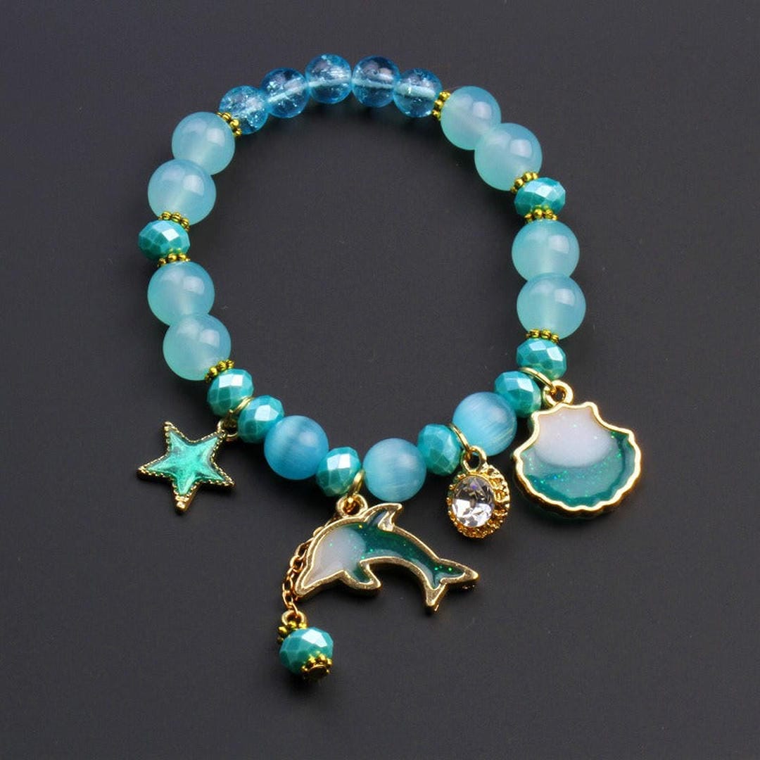 Pulsera de cuentas con encanto de concha de delfín