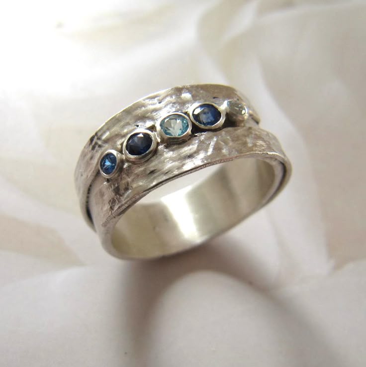 Silver Ring with Embedded Blue Stones