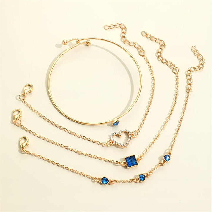 Conjunto de Pulseras de Corazones Dorados de Zafiro