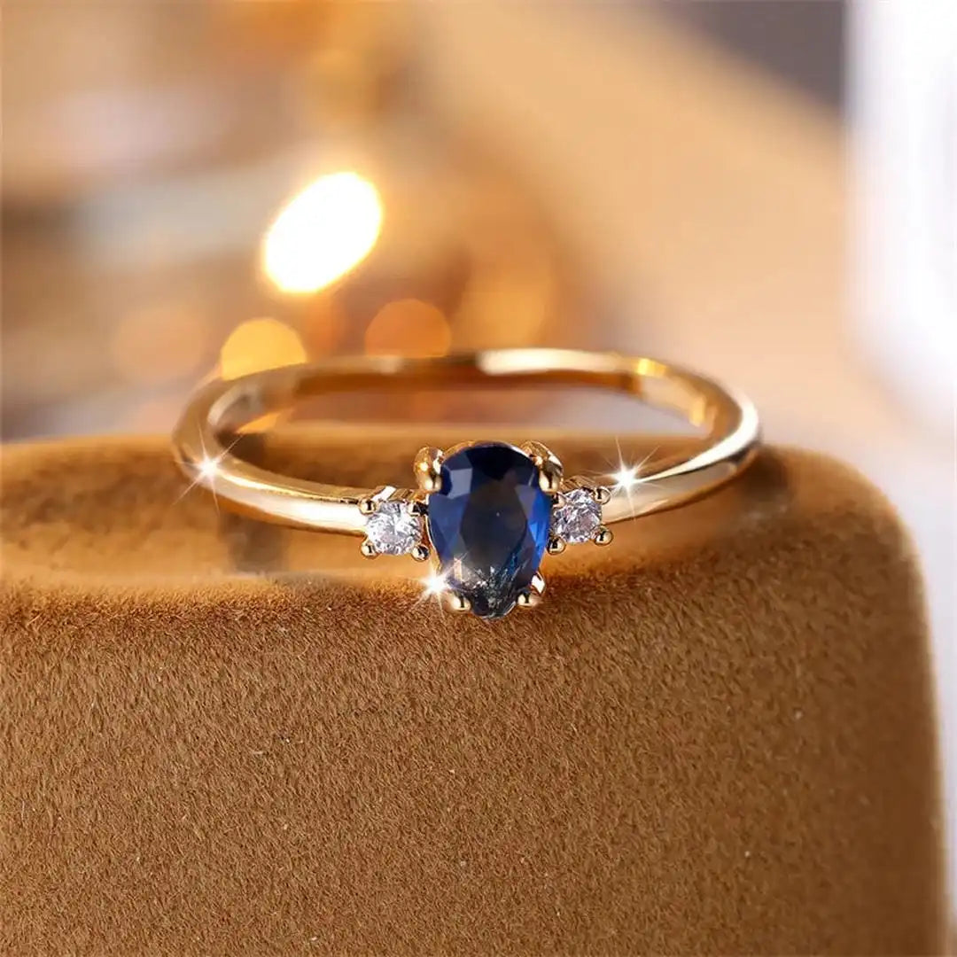 Royal Blue Sapphire Ring in Minimalist Pear Cut