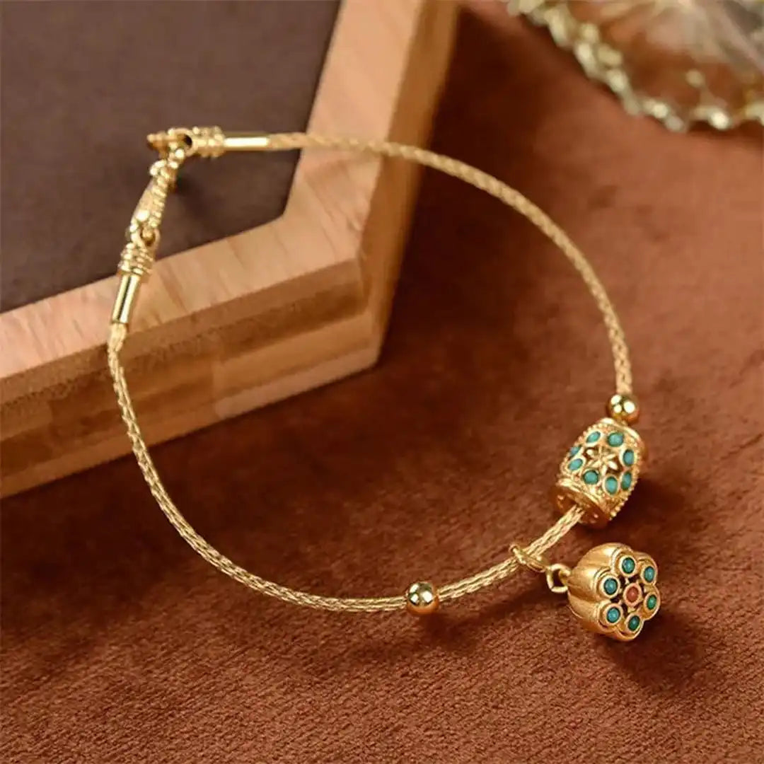 Pulsera de Loto Turquesa en Oro Antiguo
