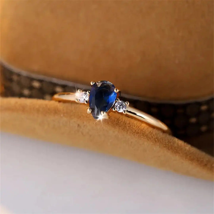 Royal Blue Sapphire Ring in Minimalist Pear Cut