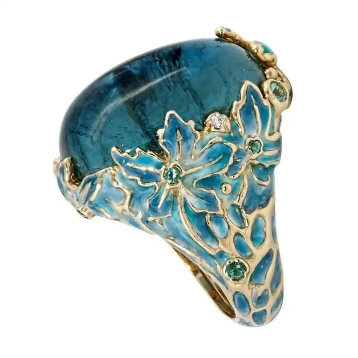 Anillo Elegante de Flor de Oro con Piedra Azul