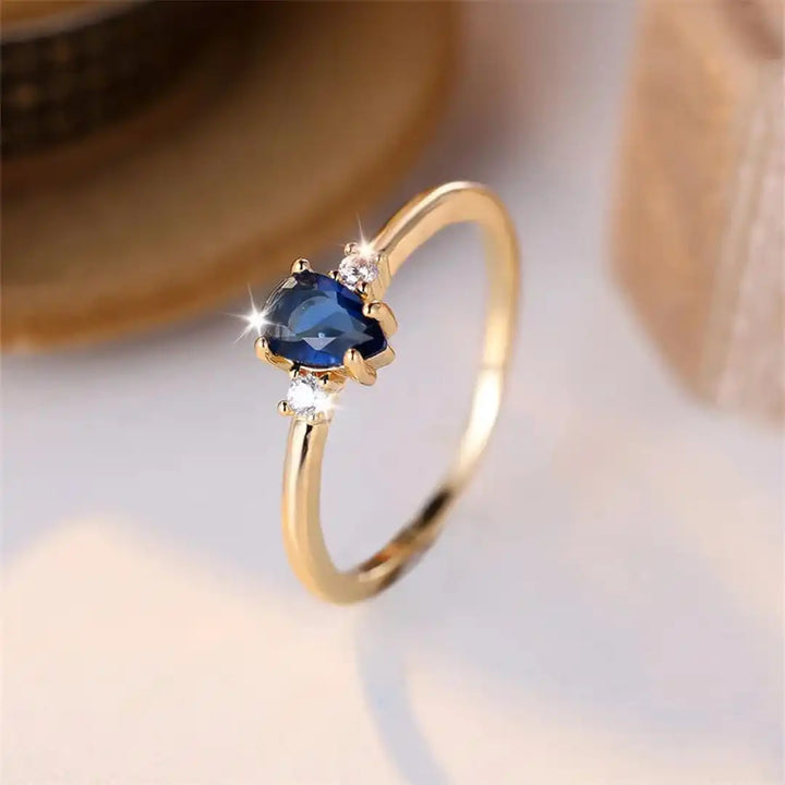 Royal Blue Sapphire Ring in Minimalist Pear Cut
