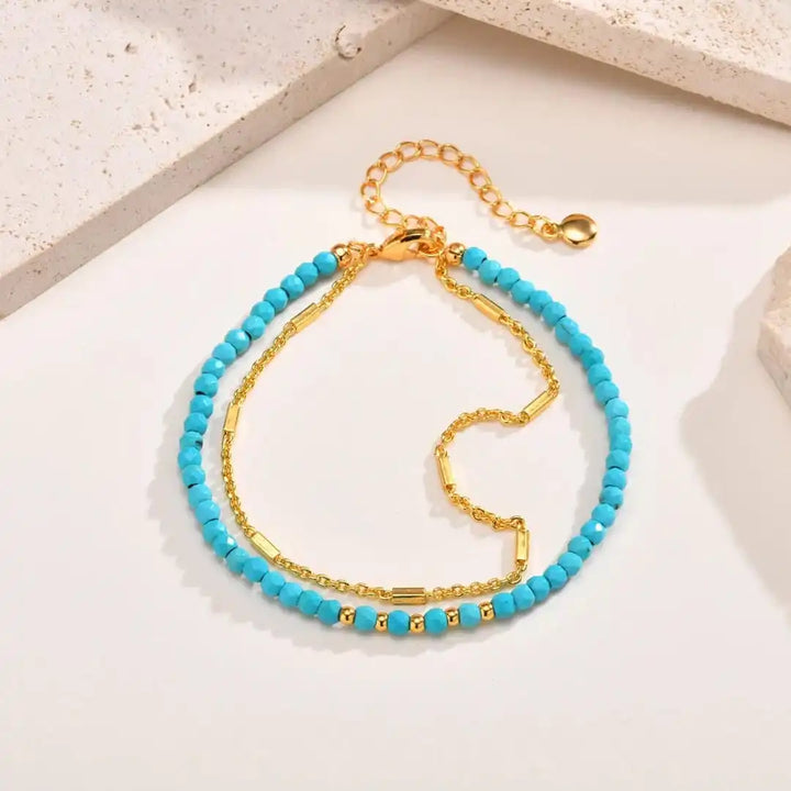 Pulsera de Turquesa con Doble Cadena de Oro Atemporal