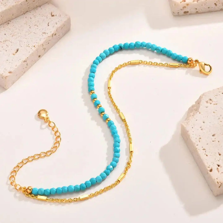 Pulsera de Turquesa con Doble Cadena de Oro Atemporal