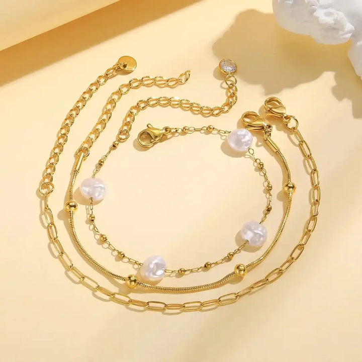 Conjunto de Pulseras Apilables con Perlas Doradas