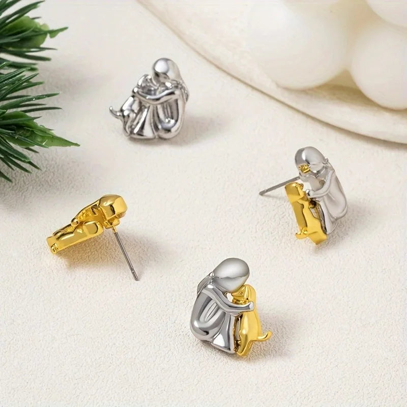 Pendientes de Abrazo en Dos Tonos: Plata y Oro