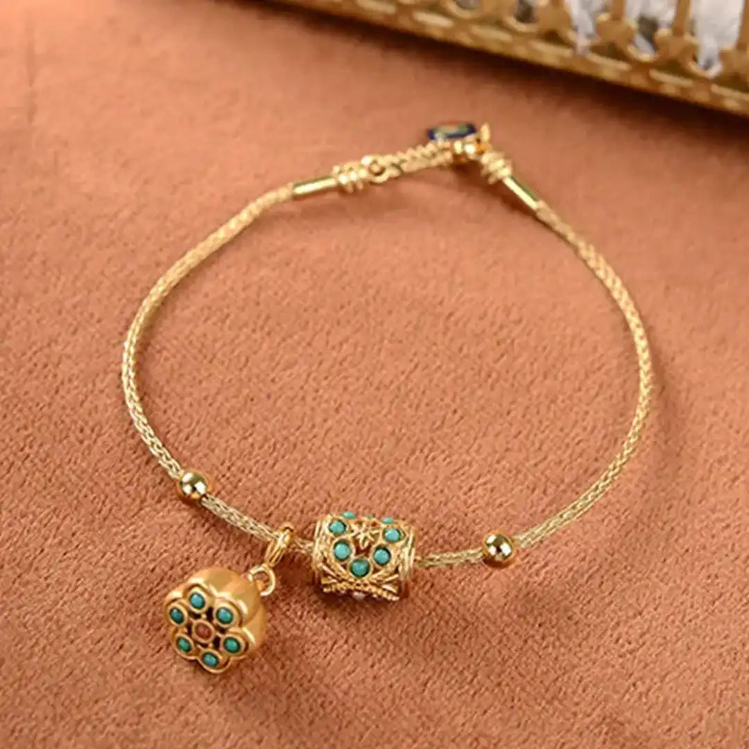 Pulsera de Loto Turquesa en Oro Antiguo
