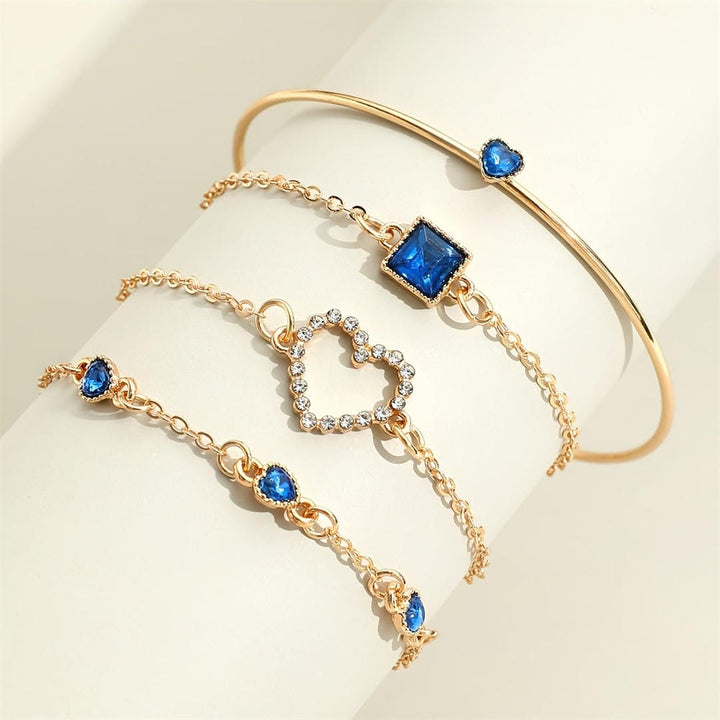 Conjunto de Pulseras de Corazones Dorados de Zafiro
